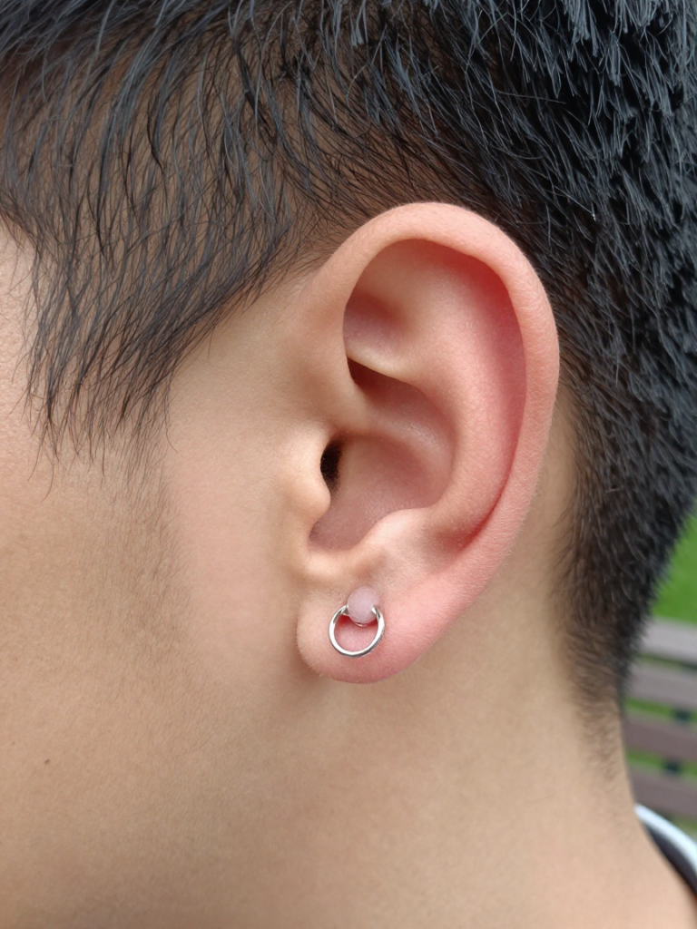 Men Ear Piercing With an Orbital Lobe Ring