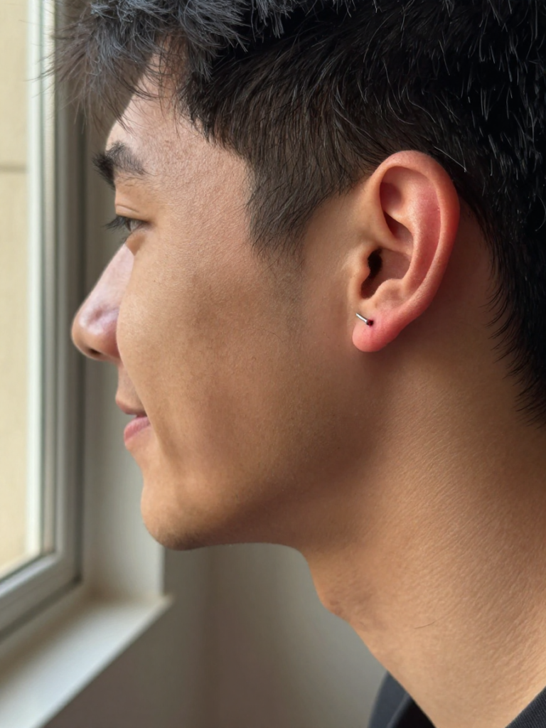 Men Ear Piercing With a Straight Industrial Bar