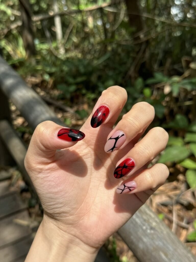 Red And Black Marble Spiderman Nails