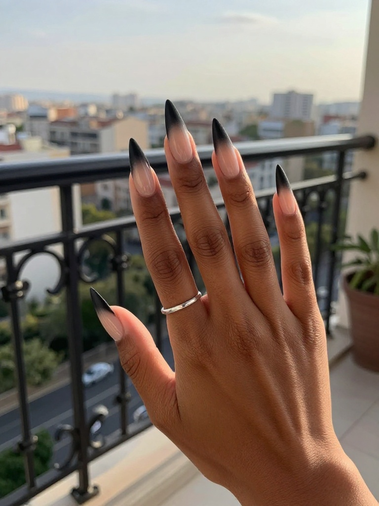 22 Stunning Stiletto Nails Ideas For Every Bold Mood 1 Smoked Onyx Ombre Stiletto Nails